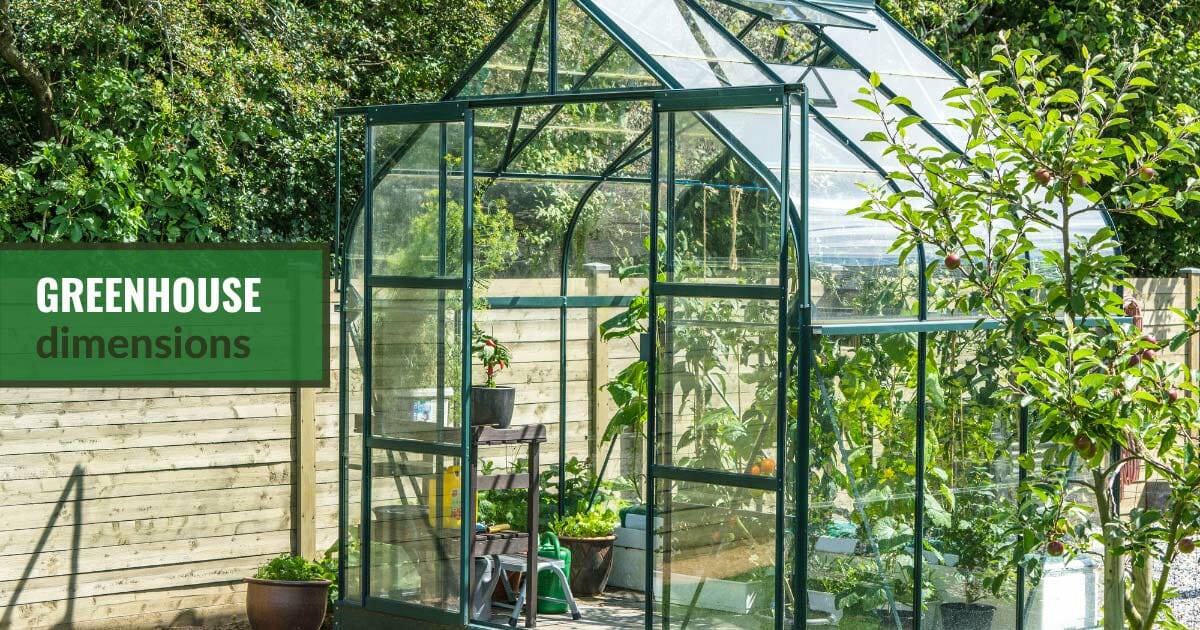 Small greenhouse in backyard with the text: Greenhouse Dimensions