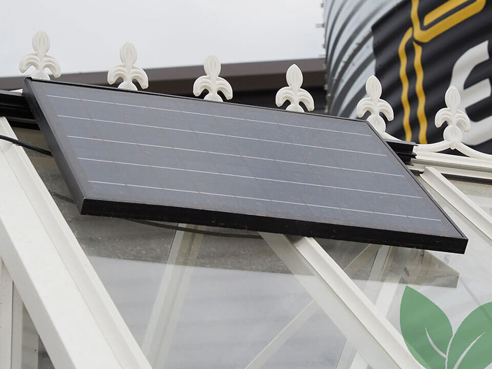 View of solar panel on greenhouse exterior