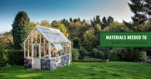 Small greenhouse on a lawn in a backyard with the text: Material needed to build a greenhouse