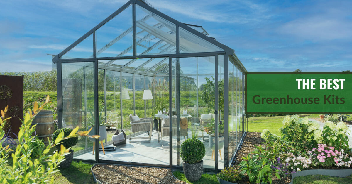Beautiful glass greenhouse in a backyard with the text: The Best Greenhouse Kits