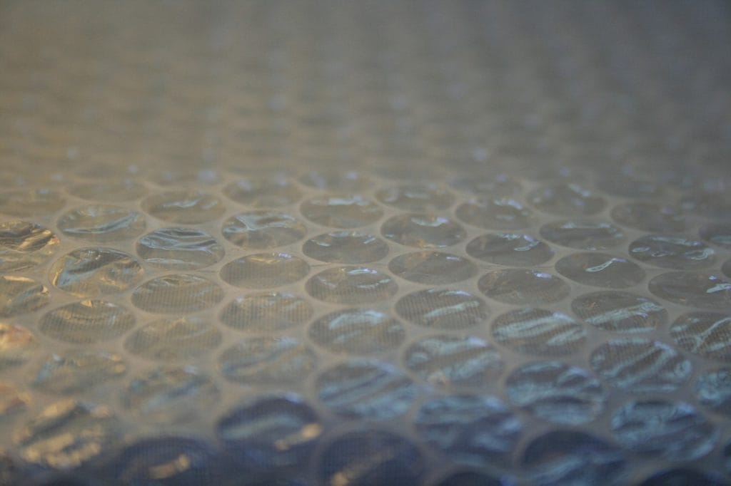 Bubble wrap is a budget friendly way to heat a greenhouse in winter