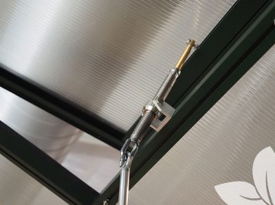 Spindle opener installed on a roof vent of an Exaco Janssens Victorian Greenhouse