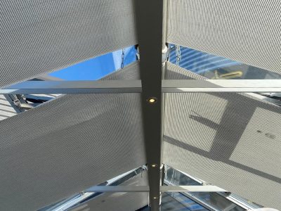 Greenhouse with shade cloths and view of support braces