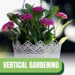 Hanging basket with flowers with text: Vertical Gardening In a Small Greenhouse