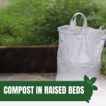 Compost bag next to raised bed with text: Compost in Raised Beds Miracle or Myth?