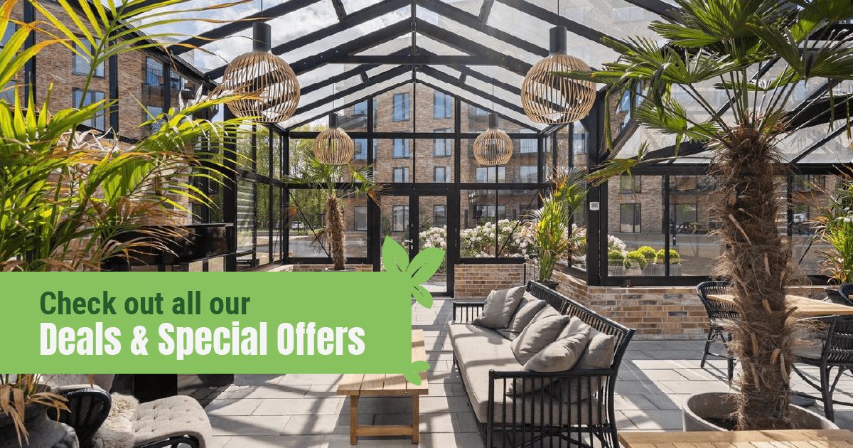 Inside a beautiful glass greenhouse with the text: Check out all our deals & Special Offers