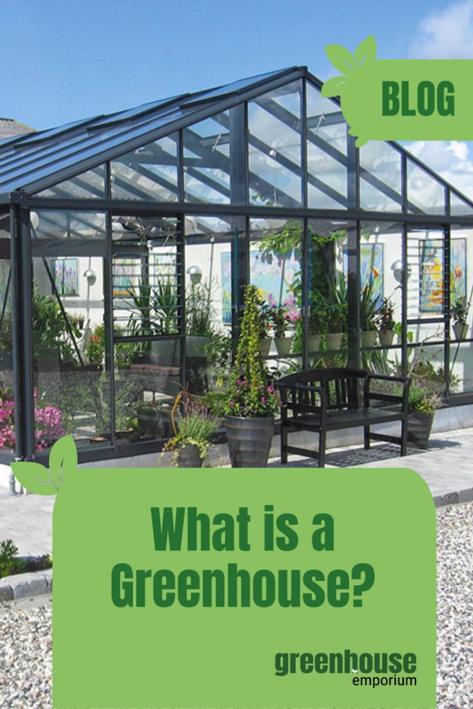 Glass greenhouse with text: What Is A Greenhouse?