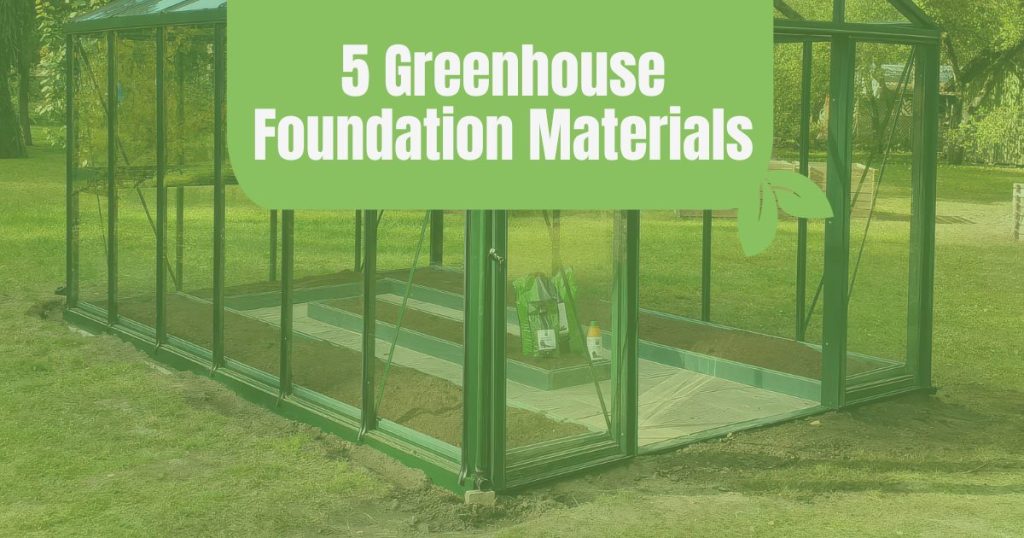 Foundation of empty glass greenhouse with garden beds