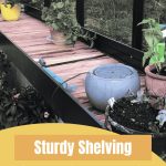 Wooden built in shelf with a few potted plants
