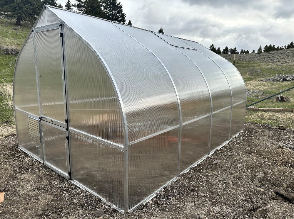Exterior of a Riga greenhouse ready to inspect in preparation for winter. 