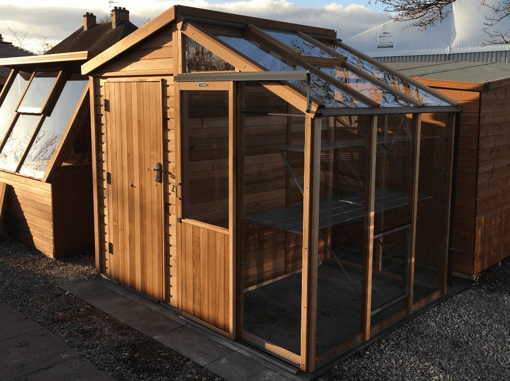 Front corner view of the greenhouse side of an Alton Fusion greenhouse