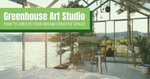 Interior of a greenhouse art studio set up on the waterfront with an easel and a painting in progress covered in a green tint with a graphic in the top left corner reading "Greenhouse art studio: how to create your dream creative space"
